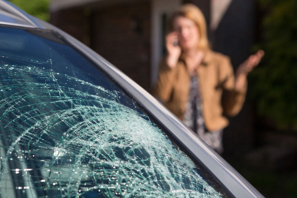 Driver reviewing insurance coverage for windshield replacement in Arizona