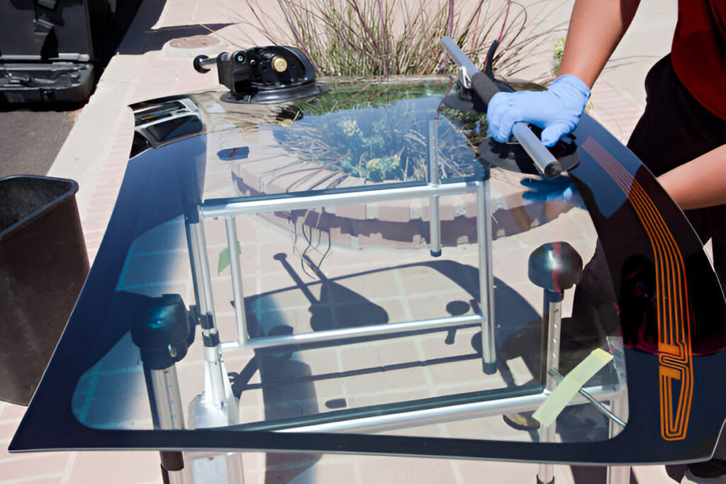 Windshield being prepped for installation